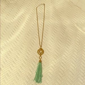 Teal tassel necklace with gold pendant